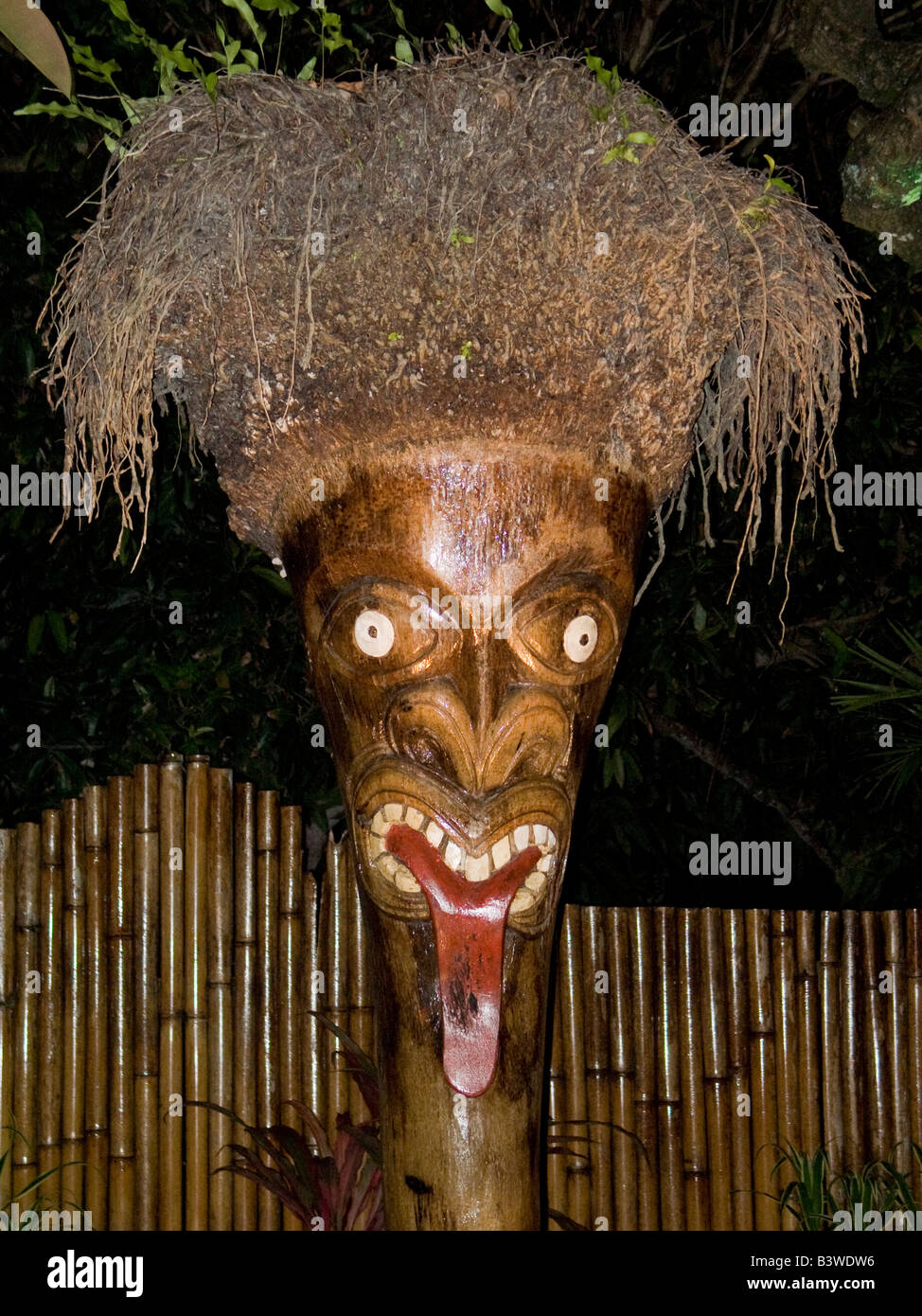 Oceania, French Polynesia, Bora Bora. Tiki statue at Bloody Mary's