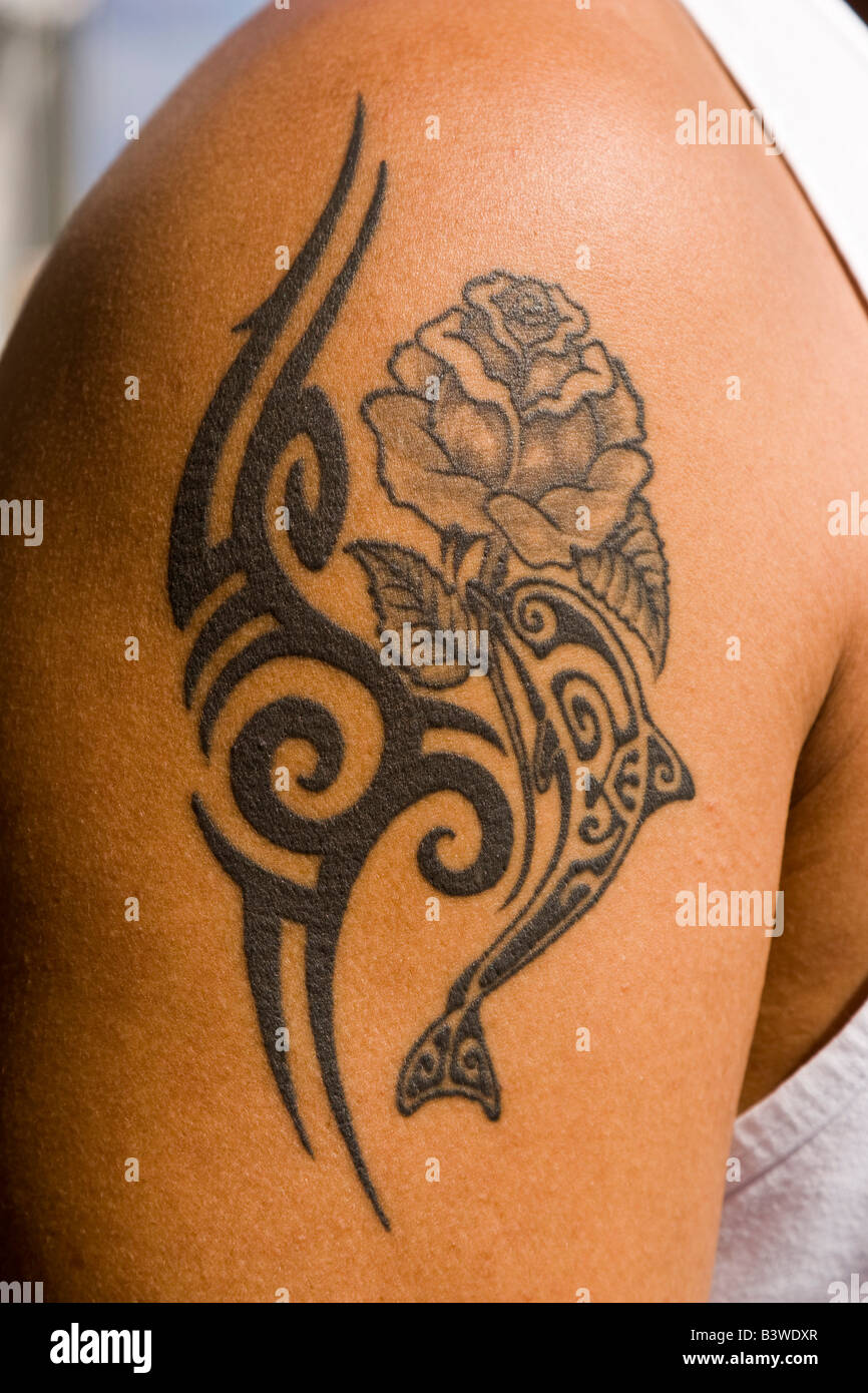 French Polynesia. Traditional Polynesian tattoo on man's arm. Stock Photo