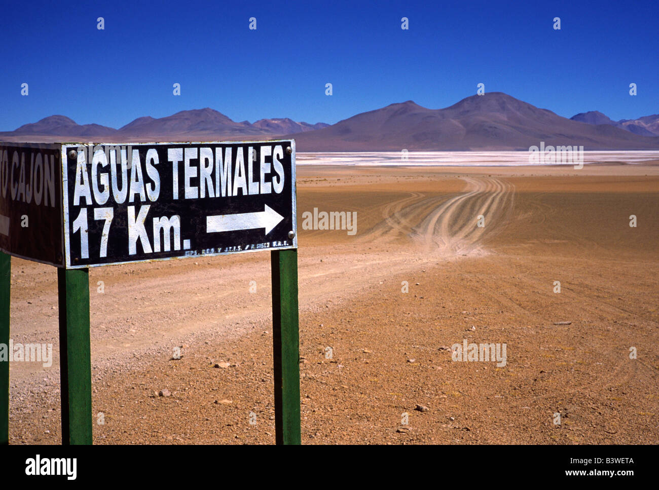Bolivia, Aguas Calientes, Sign pointing the way to hot springs or aguas termales at Aguas Calientes on Southwest Circuit Tour. Stock Photo