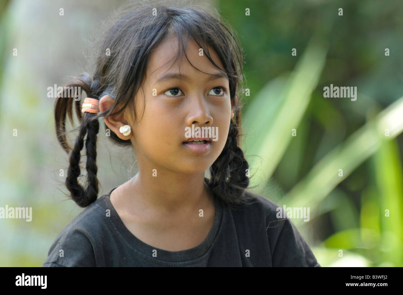 young balinese girl at village cremation, gianyar ,bali , indonesia Stock Photo