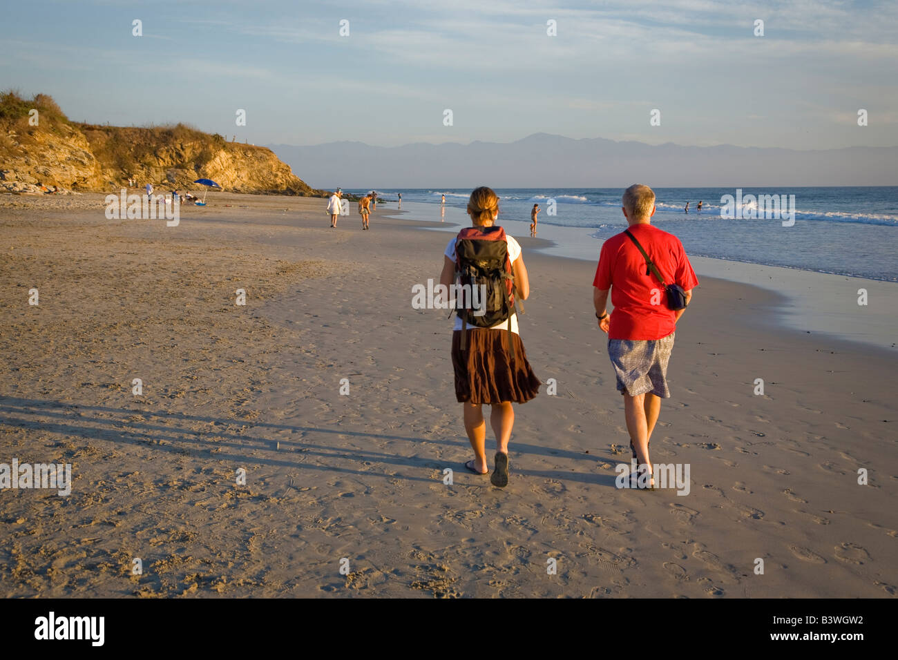 Mexico, Puerto Vallarta.  A father and his daughter on the beach near Punta Mita.  (MR) Stock Photo