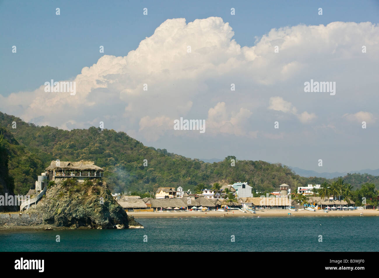 Mexico, Jalisco, Melaque. Bar atop high rock / Bahia de Navidad Bay