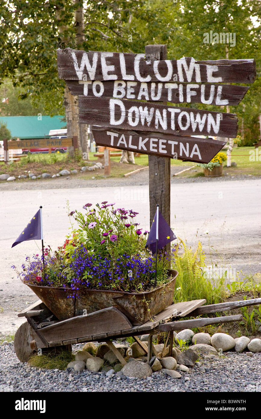 USA, Alaska, Talkeetna. A rustic handmade sign in front of old