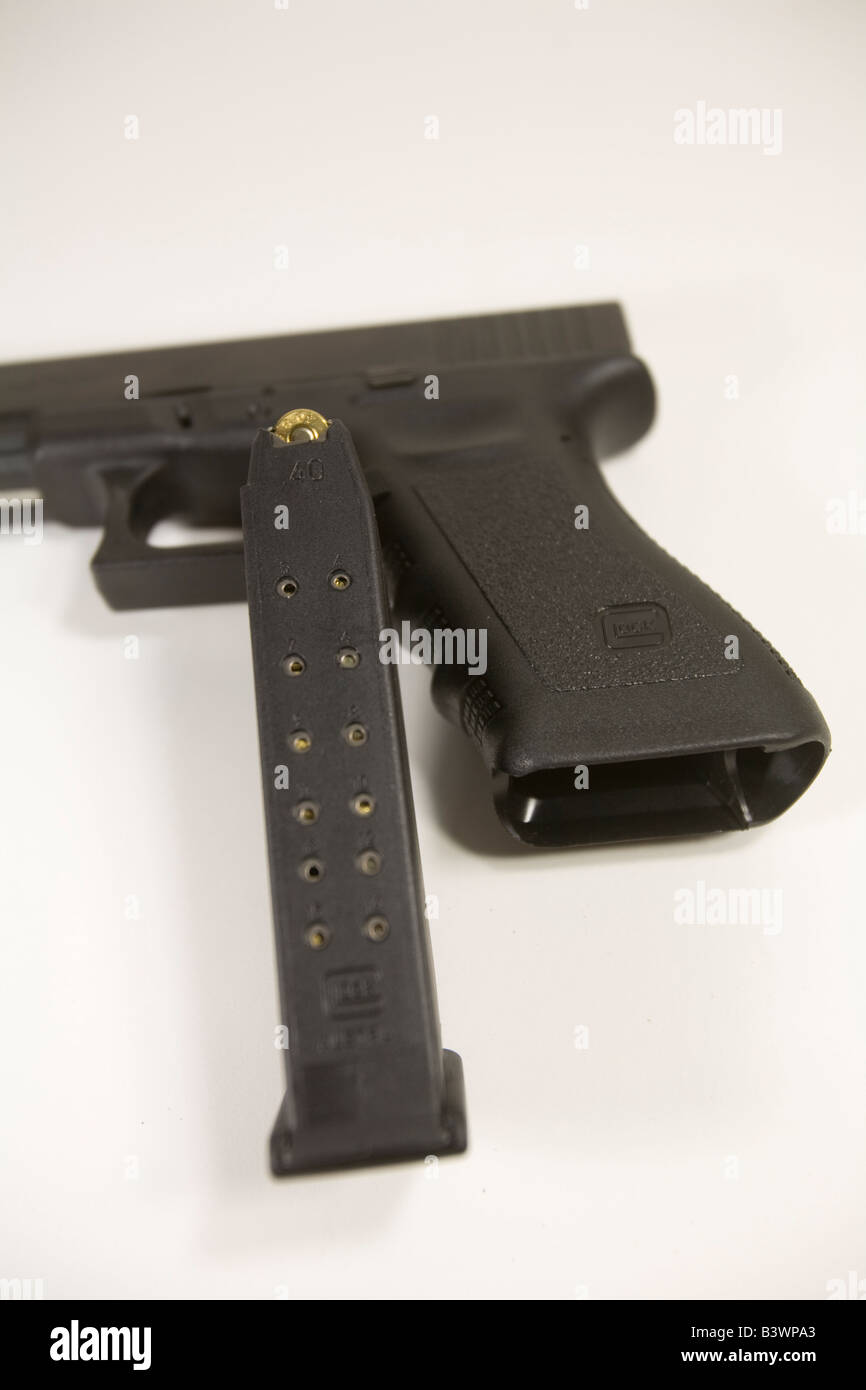 Glock Model 22 .40 caliber pistol with the 15 round magazine removed. Stock Photo