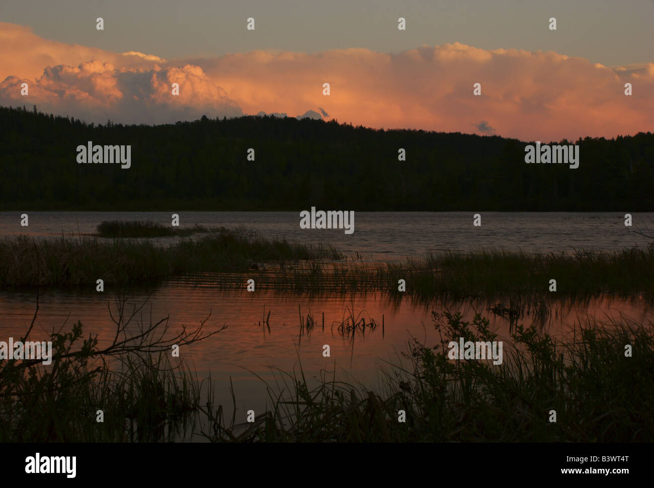 The sun sets over Lake of Two Rivers in Algonquin Provincial Park in Ontario, Canada. Stock Photo