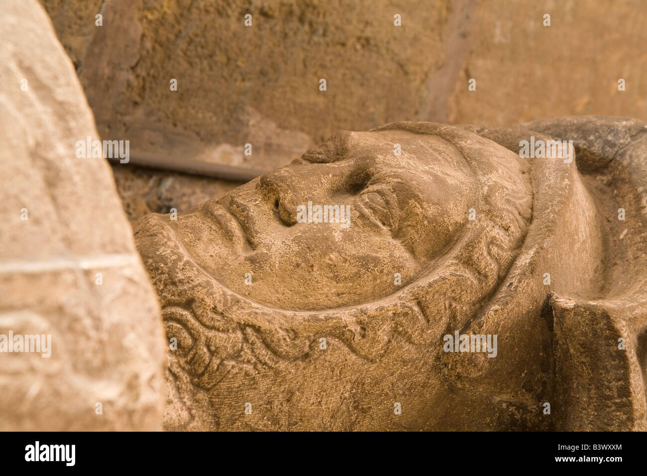 The stone effigy of a knight lies in the medieval church of St Lawrence in Warkworth, Northumberland. Stock Photo