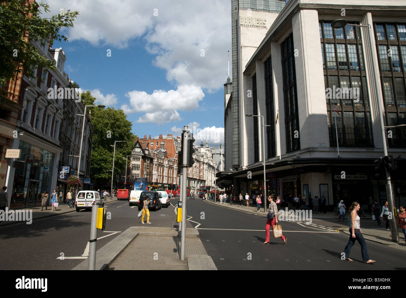 New shared space road layout in Kensington High Street London England UK Stock Photo