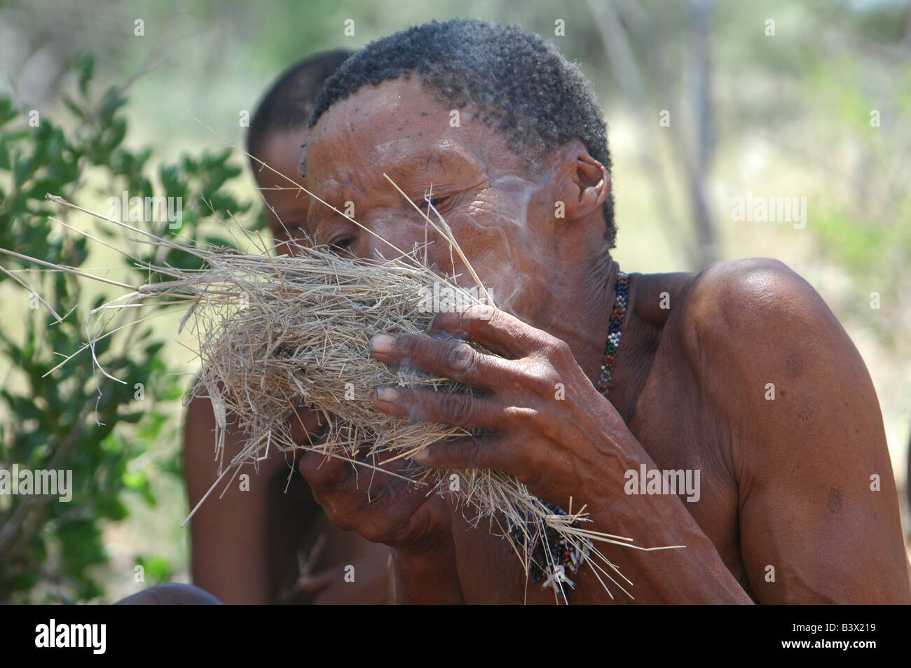 Bushman making fire hi-res stock photography and images - Alamy