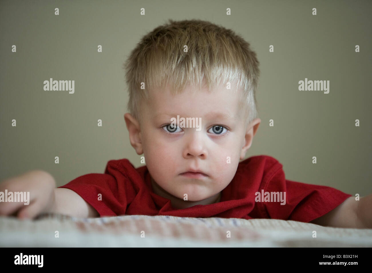 Sad looking boy Stock Photo Alamy