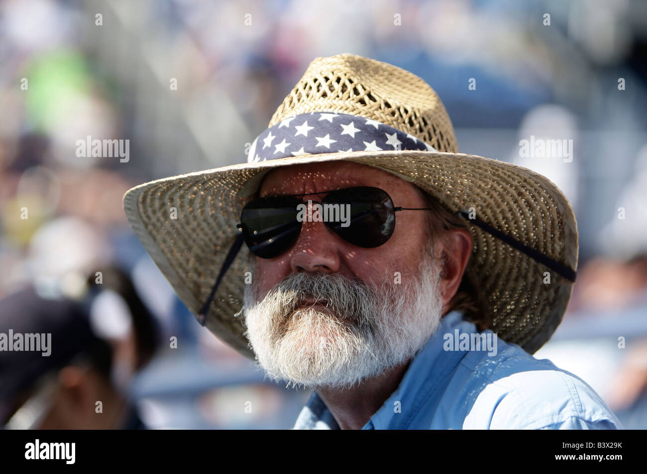 Portrait of a greybearded tennis fan 