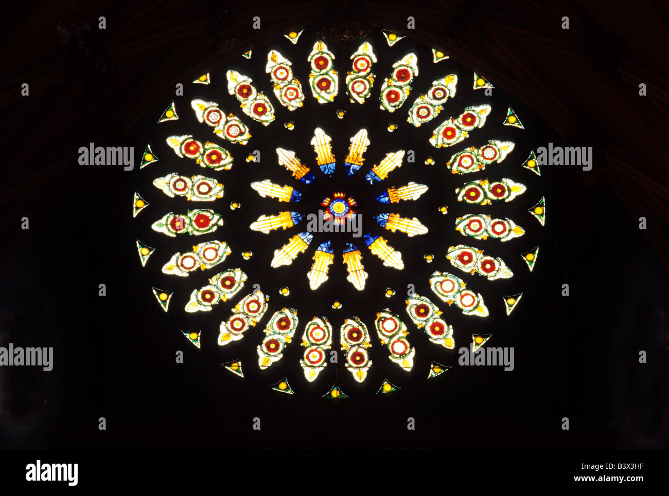 York Minster south transept rose window restored after fire stained glass geometric pattern Yorkshire England UK Stock Photo