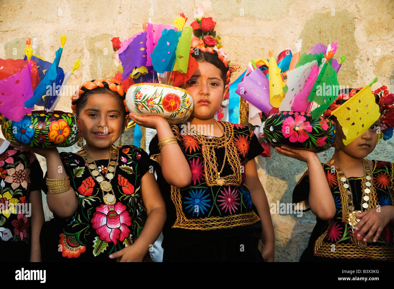Tehuana girls are dressed up in traditional costumes during Easter celebrations in Oaxaca, Mexico, Latin America Stock Photo
