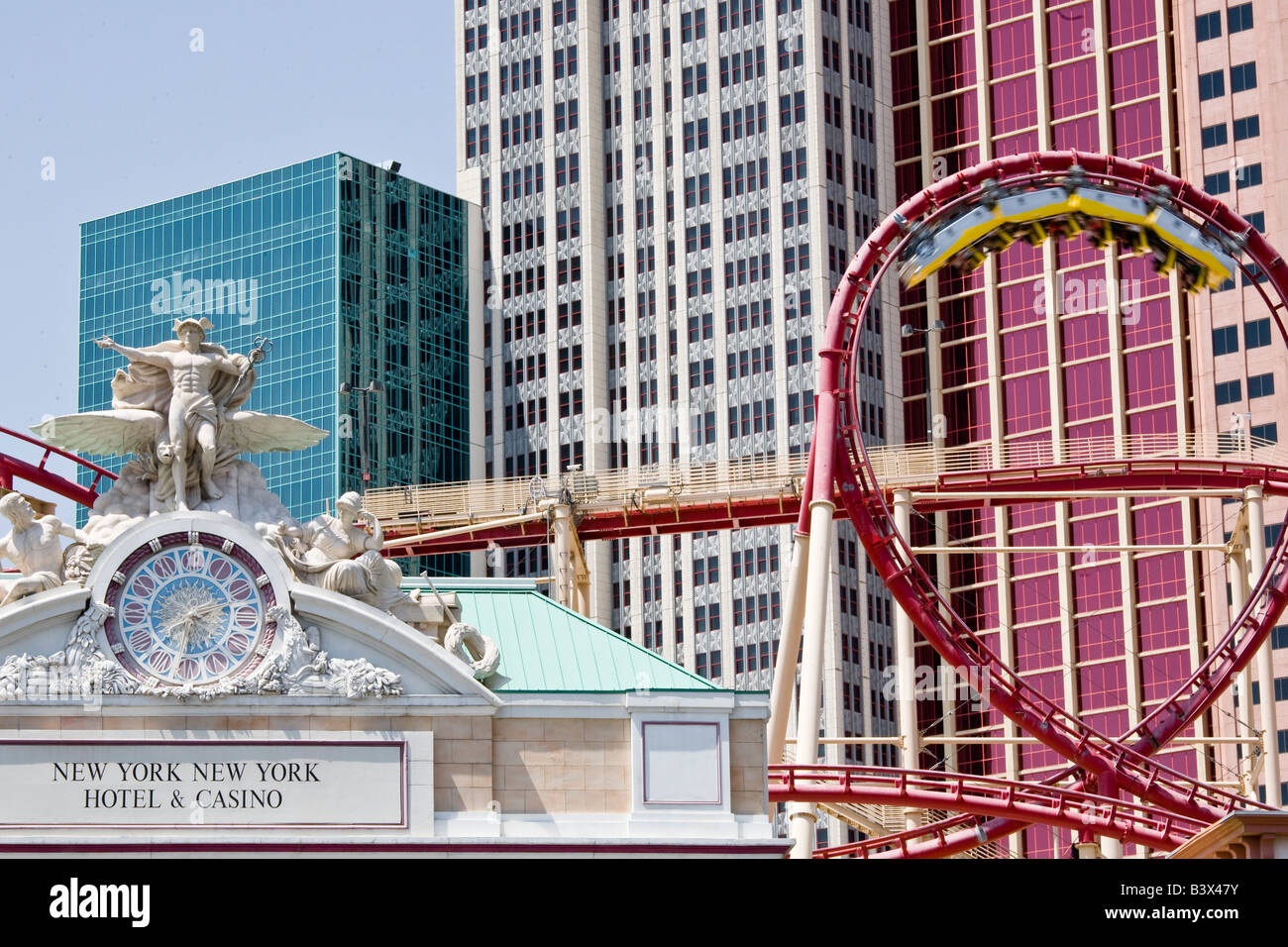 A roller coaster whisks passengers past the entrance to the New York