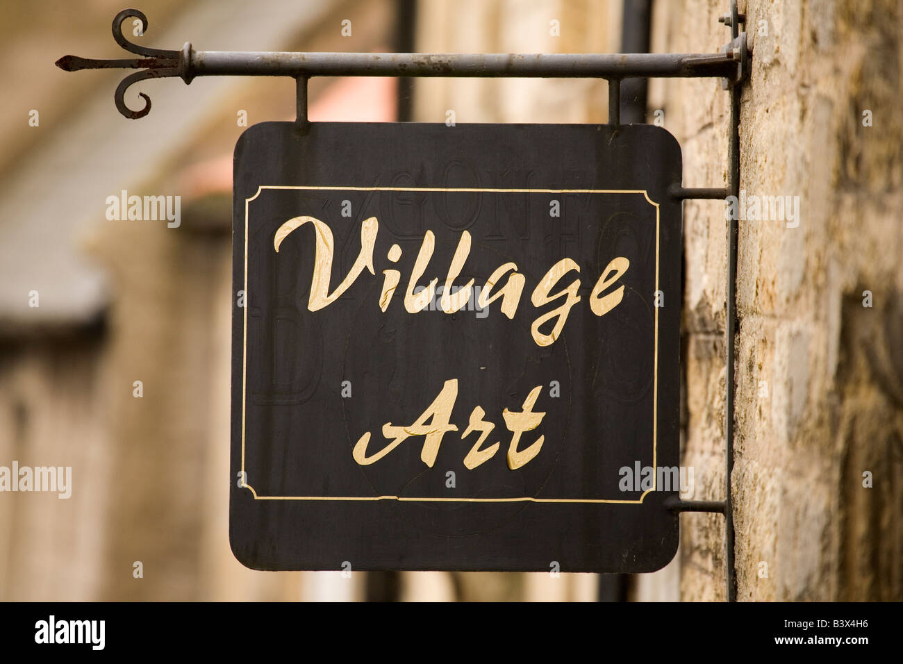 A shop sign in a Northumberland village advertises Village Art, a shop ...