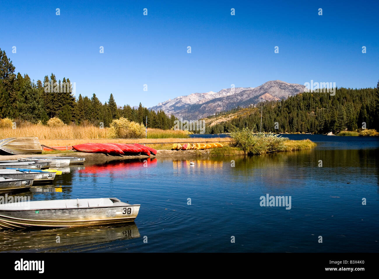 Rowboats and kayaks at the Hume Lake Christian Camp Campus in Giant