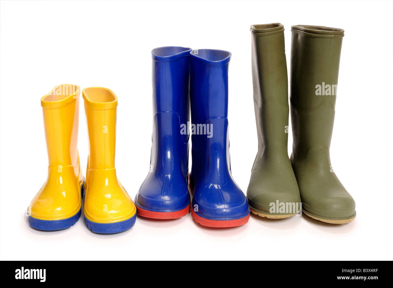 Three pairs of wellington boots Stock Photo Alamy