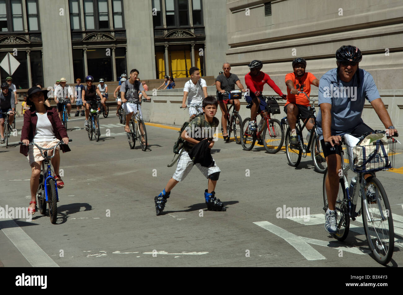 Bicycles and pedestrians take to the streets for the New York Summer Streets event Stock Photo