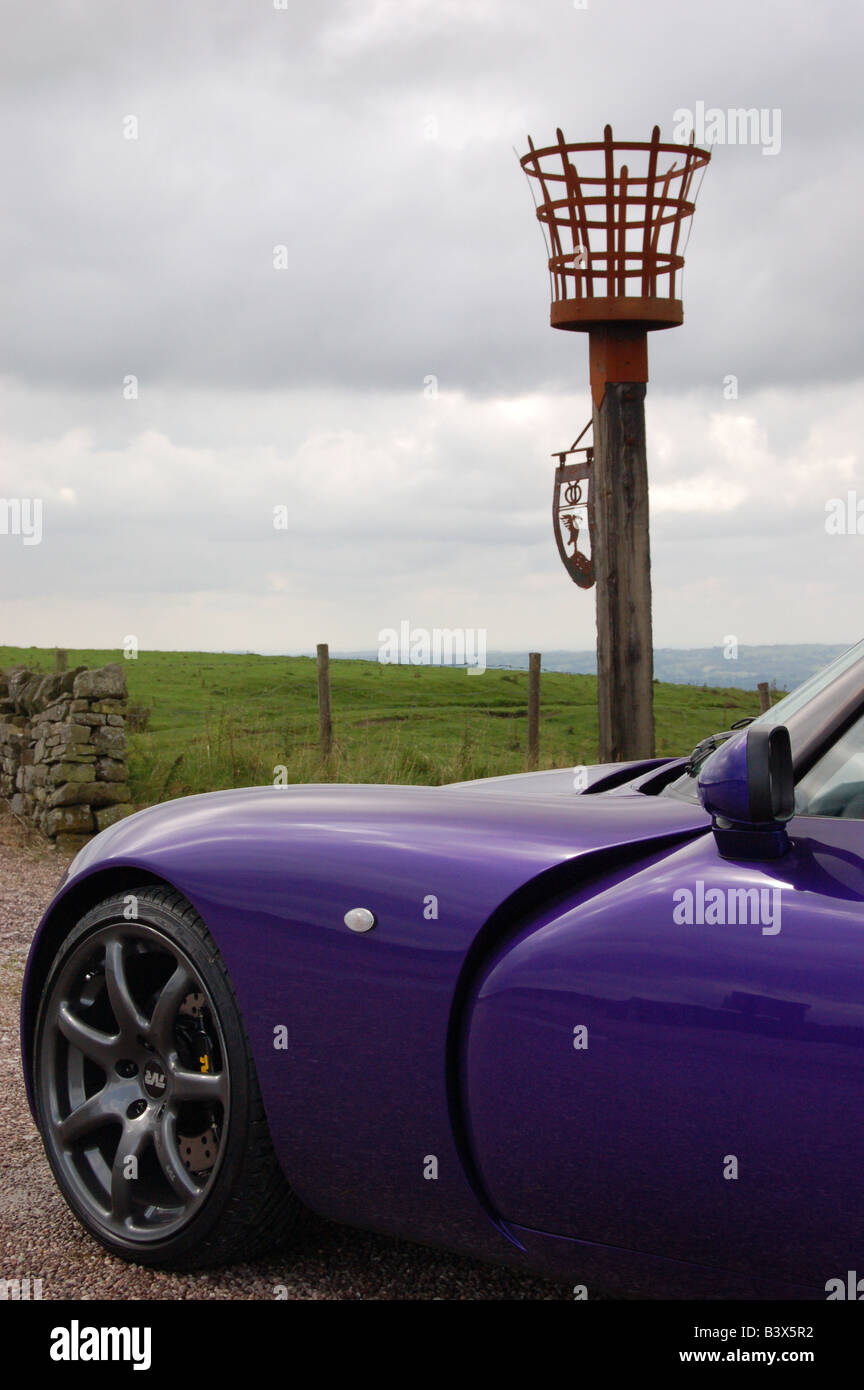 Front quarter of a TVR T350C sports car, by a beacon, in the Peak District. Stock Photo