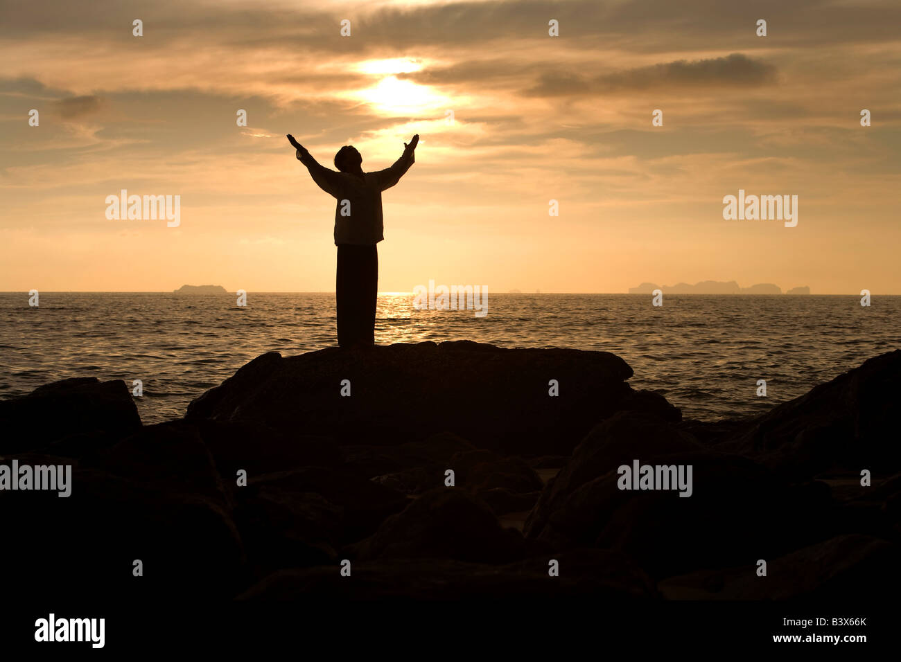 Silhouette man praying hi-res stock photography and images - Alamy