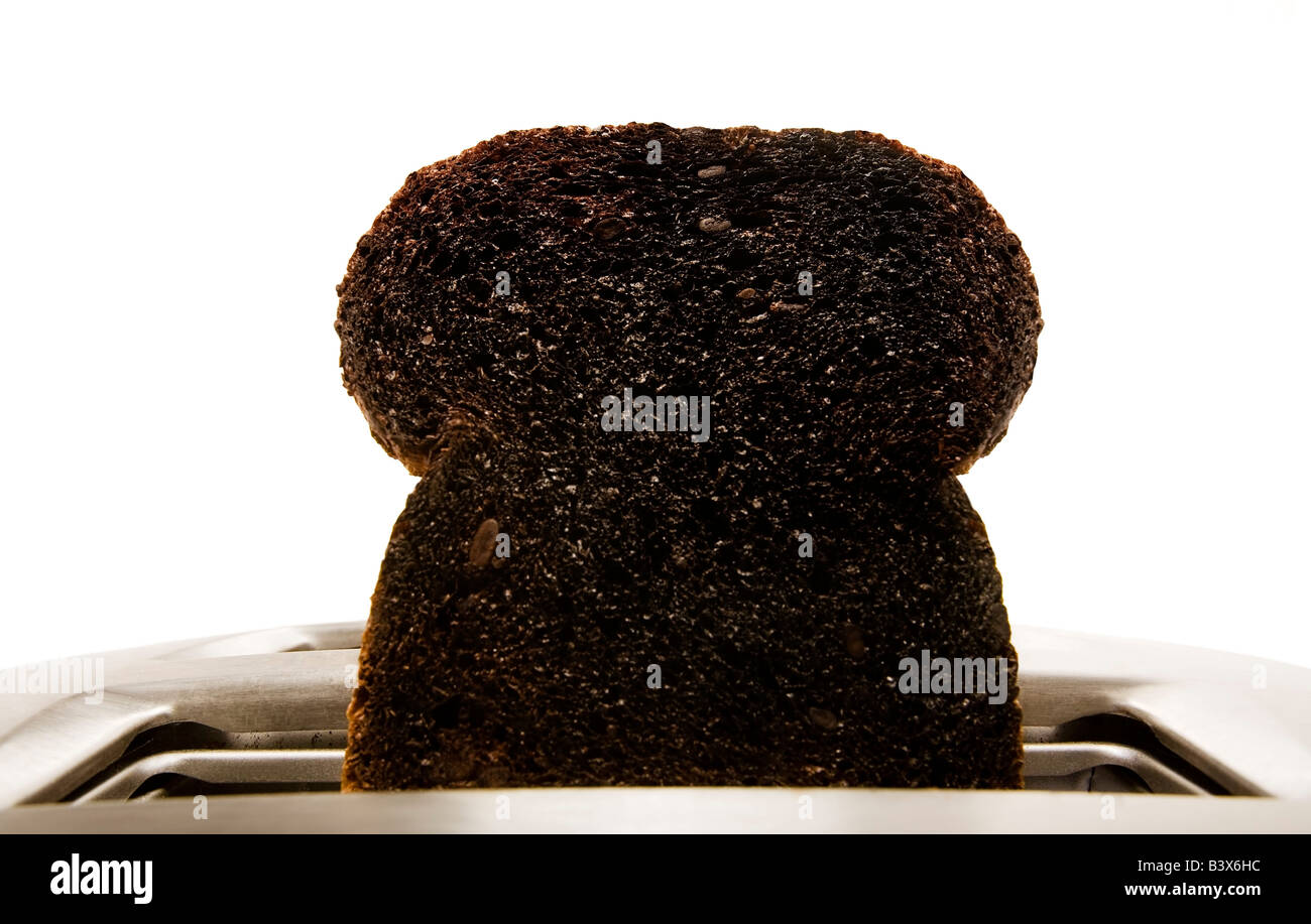 Burnt toast in toaster Stock Photo Alamy