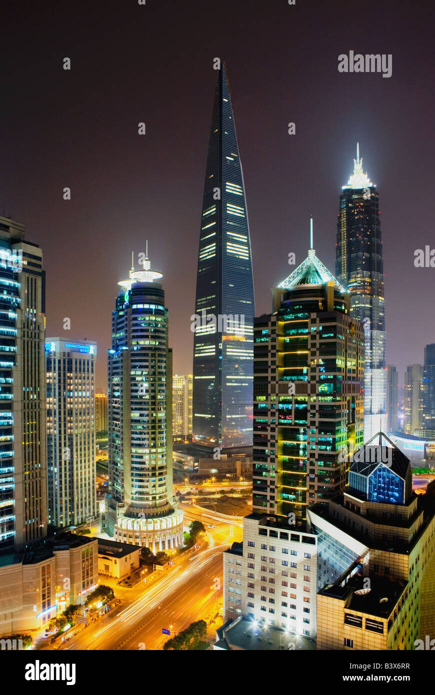 Financial district office buildings including the Shanghai World Financial Center (C) and the Jin Mao Tower. Pudong, Shanghai. Stock Photo