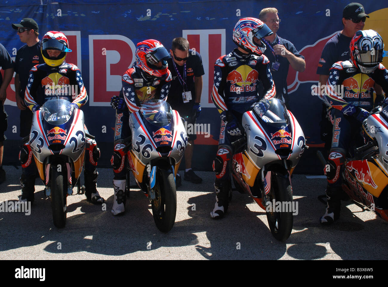 Young rookie motorcycle racers are lining up before going out for qualifying. Stock Photo