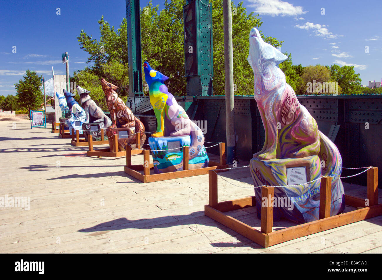 A row of concrete wolfe sculptures at The Forks in Winnipeg Manitoba Canada Stock Photo