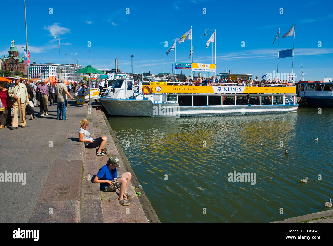 People at the pier by Kauppatori market square in Helsinki Finland Europe Stock Photo