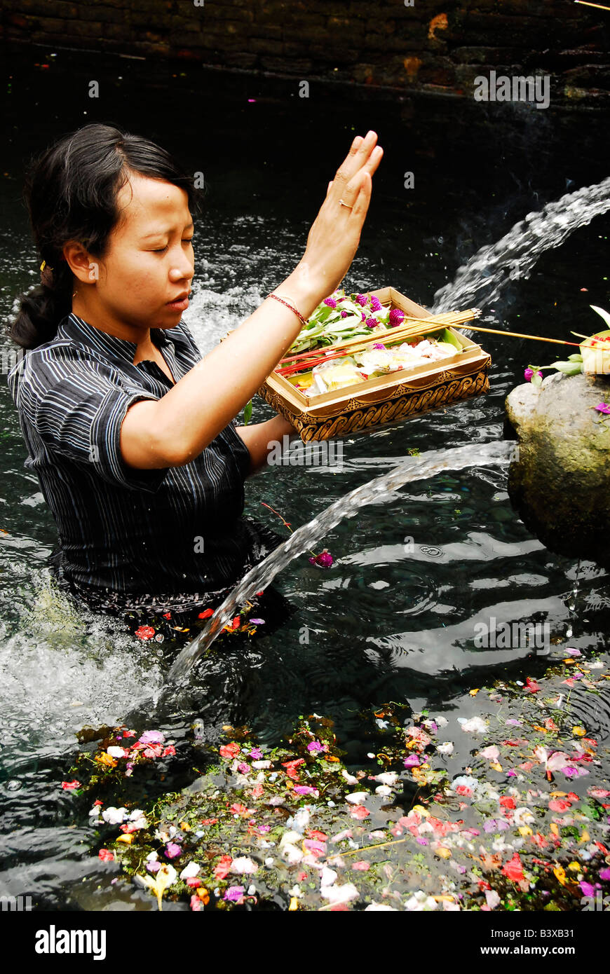 Lady Bathing And Praying In The Holy Springs Of Tirta Empul, Pura Tirta ...