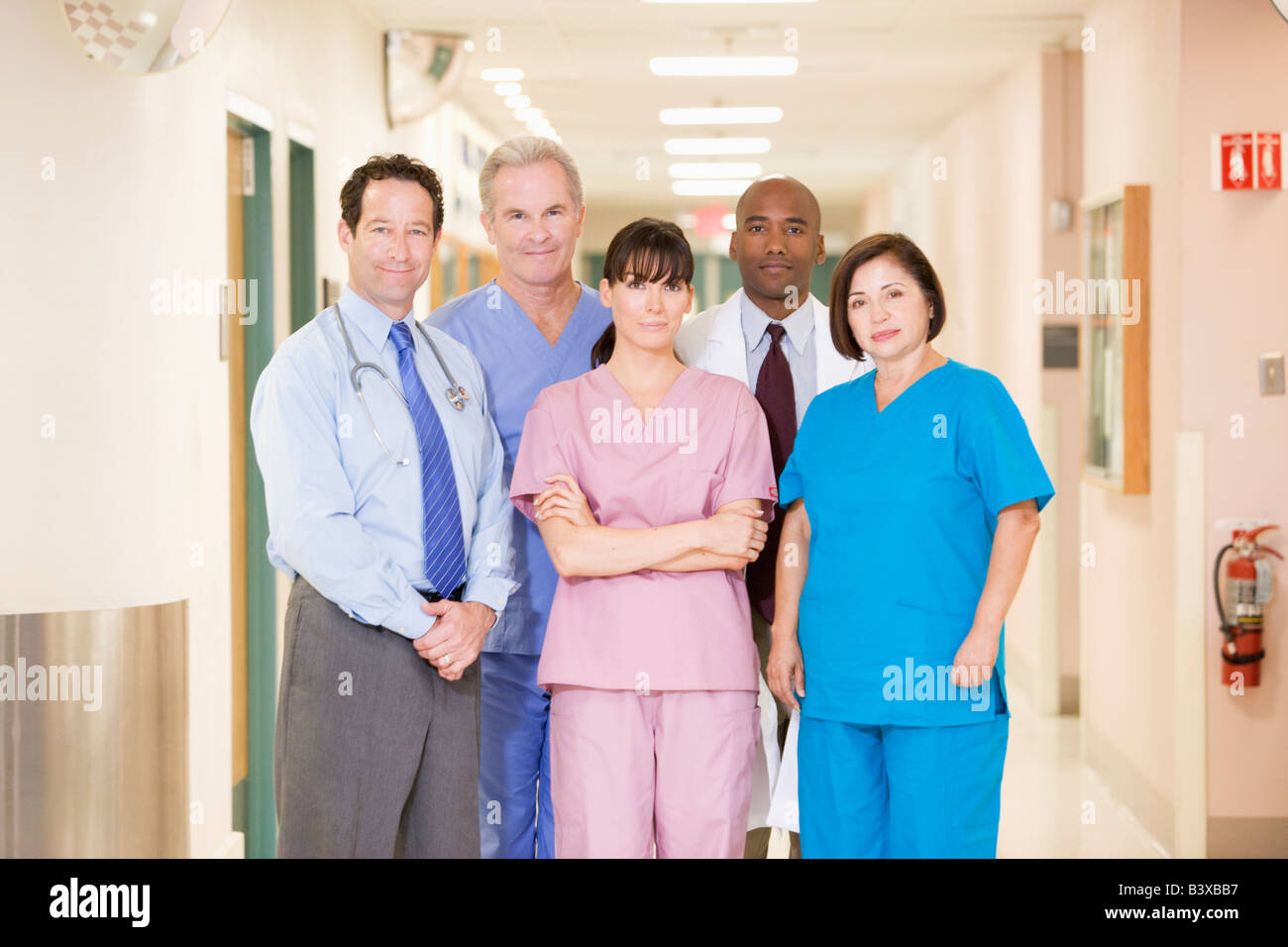Hospital Team Standing In A Corridor Stock Photo - Alamy
