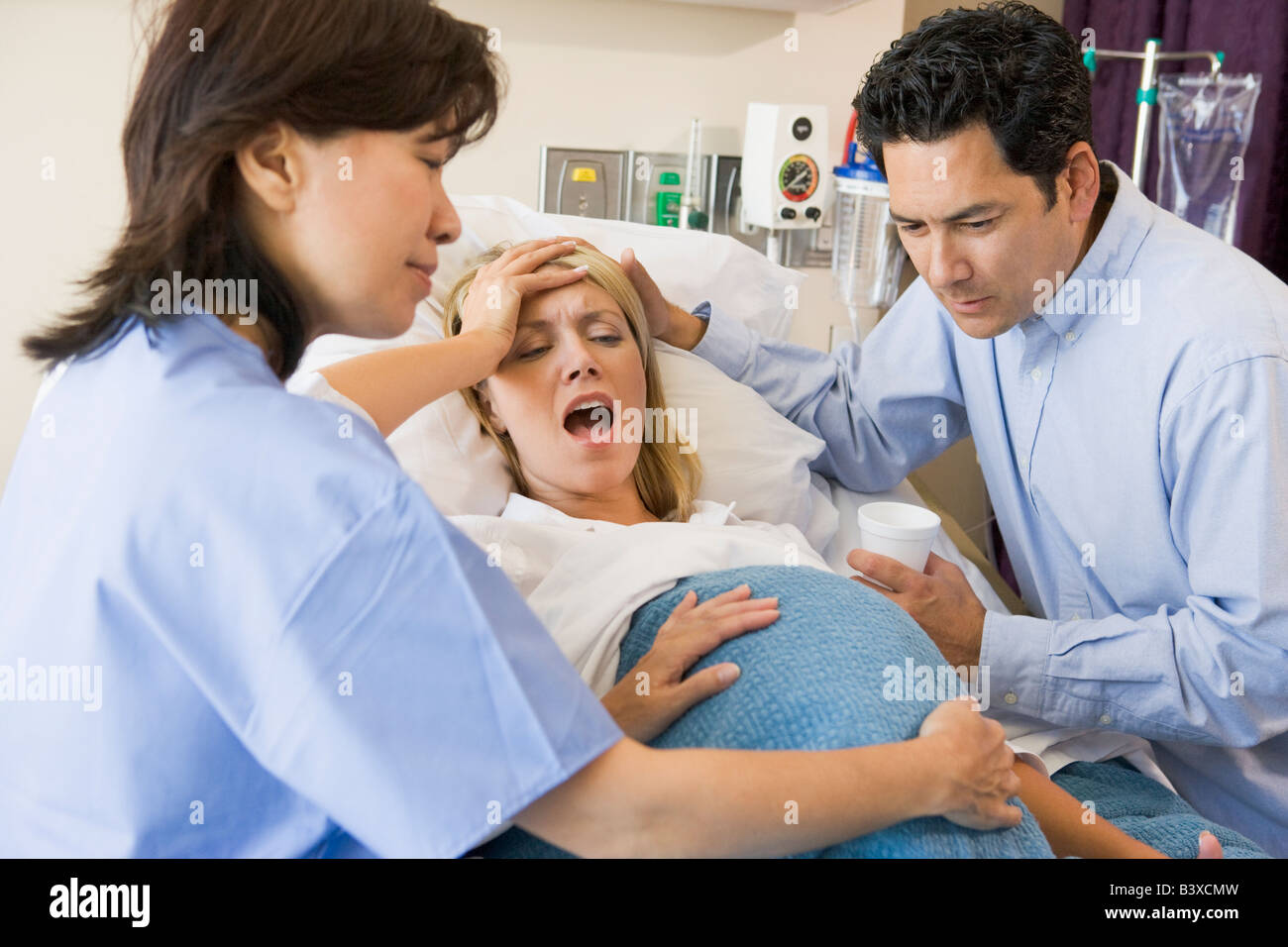 Woman Giving Birth Stock Photo