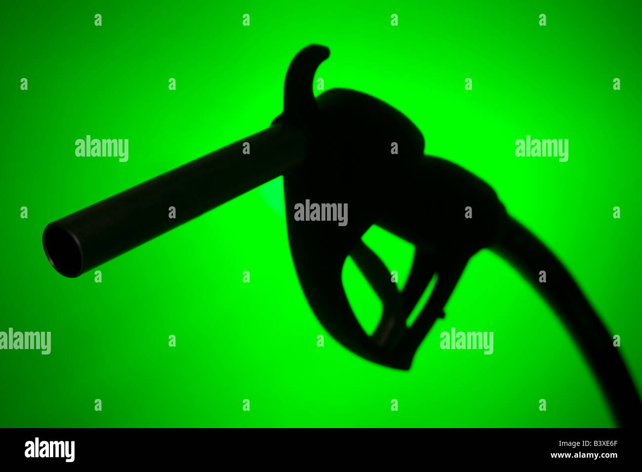 Fuel Pump Silhouette Against A Green Background Stock Photo