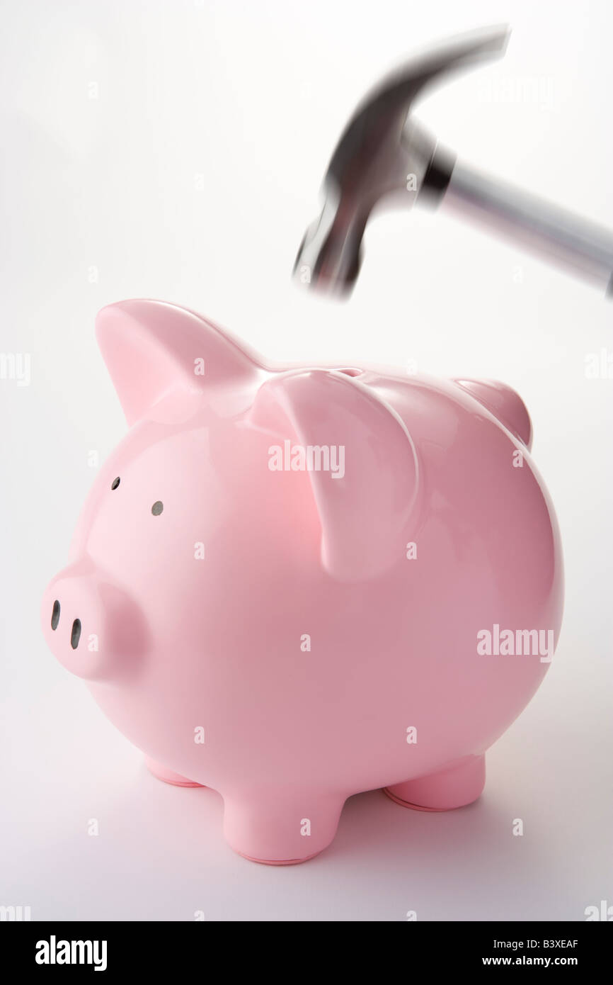 Hammer Aiming For Piggy Bank Stock Photo - Alamy