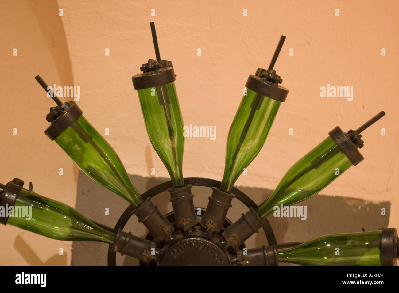 bottles on a corking machine Stock Photo Alamy