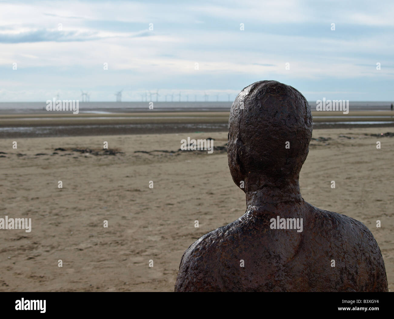 Another Place detail from one of 100 cast Iron statues installed on Crosby Beach near Liverpool artist Antony Gormley Stock Photo