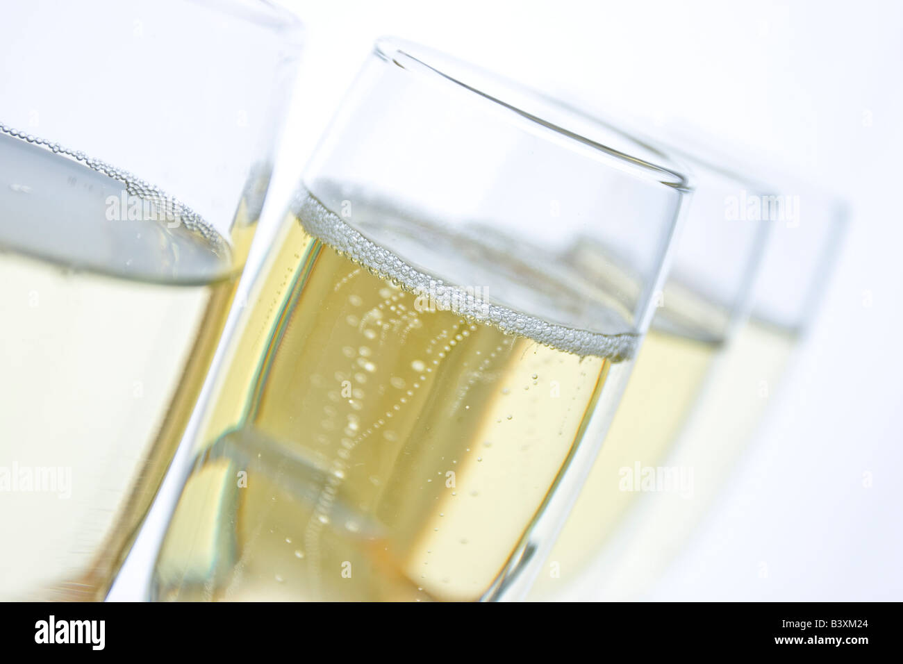 Detail of champagne bubbles in glass Diagonal shot Stock Photo