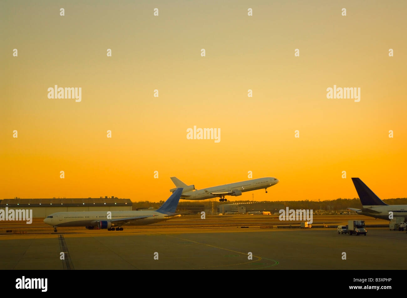A commercial airplane taking off Stock Photo
