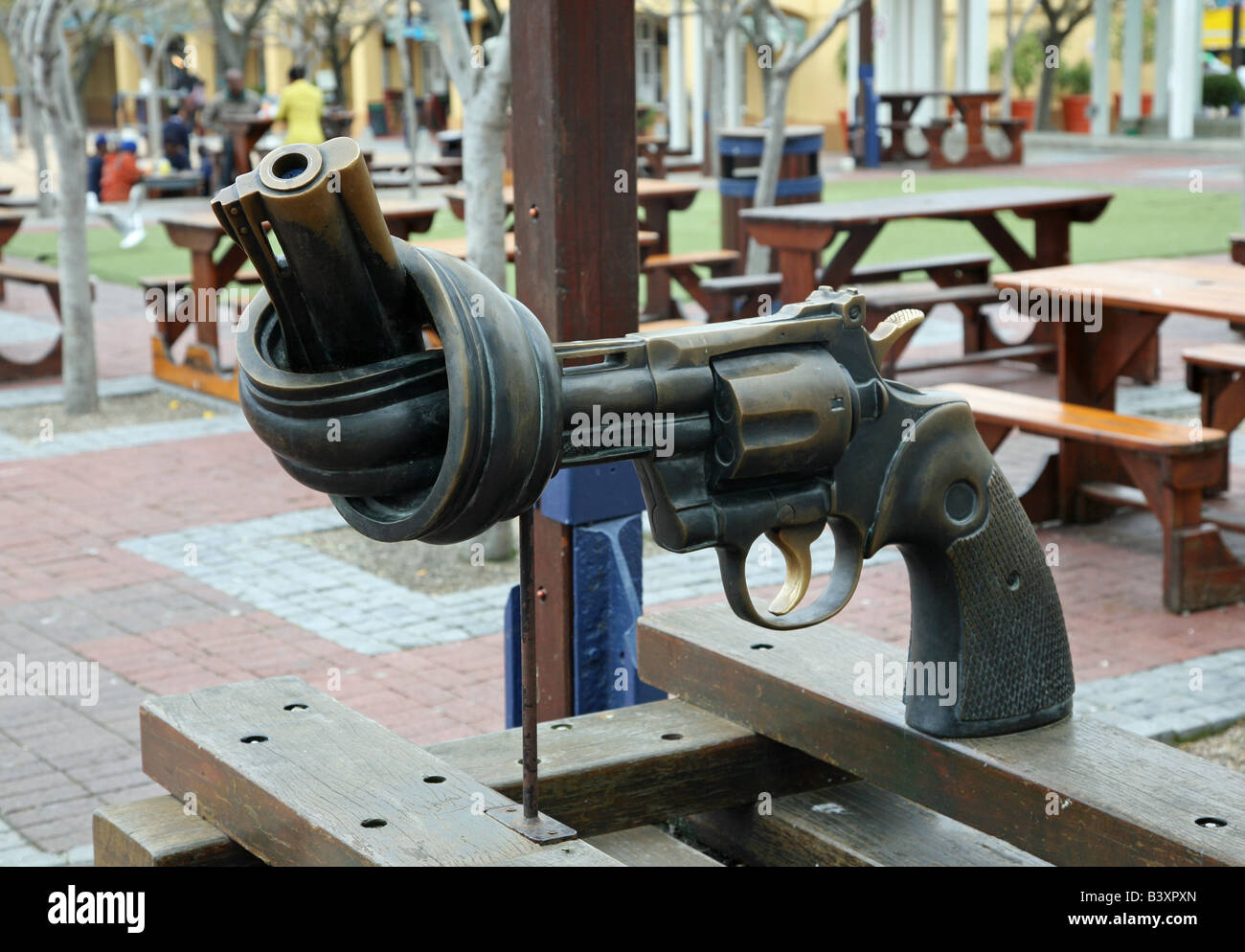 Sculpture of a gun with a twisted barrel tied in a knot on the Victoria