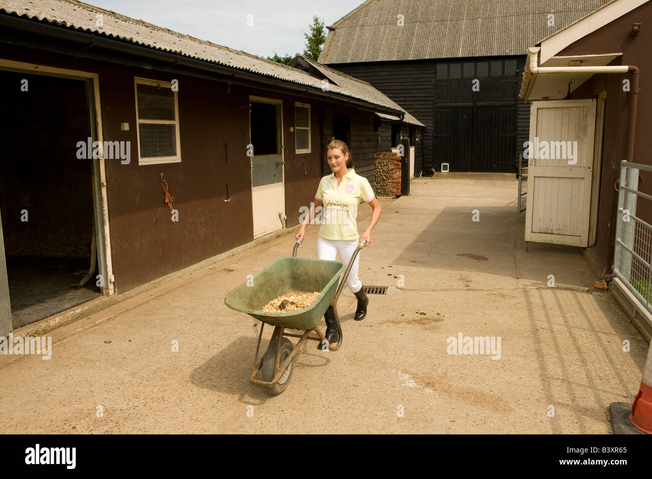 Mucking Out Stable High Resolution Stock Photography and Images Alamy