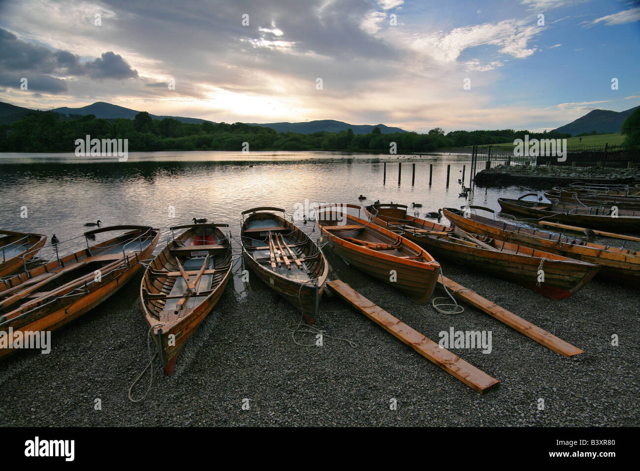 Lake District evening  rowing boats sunset reflet  dazzling Stock Photo
