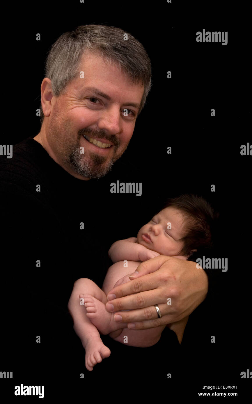 Father and 1 month old son Stock Photo