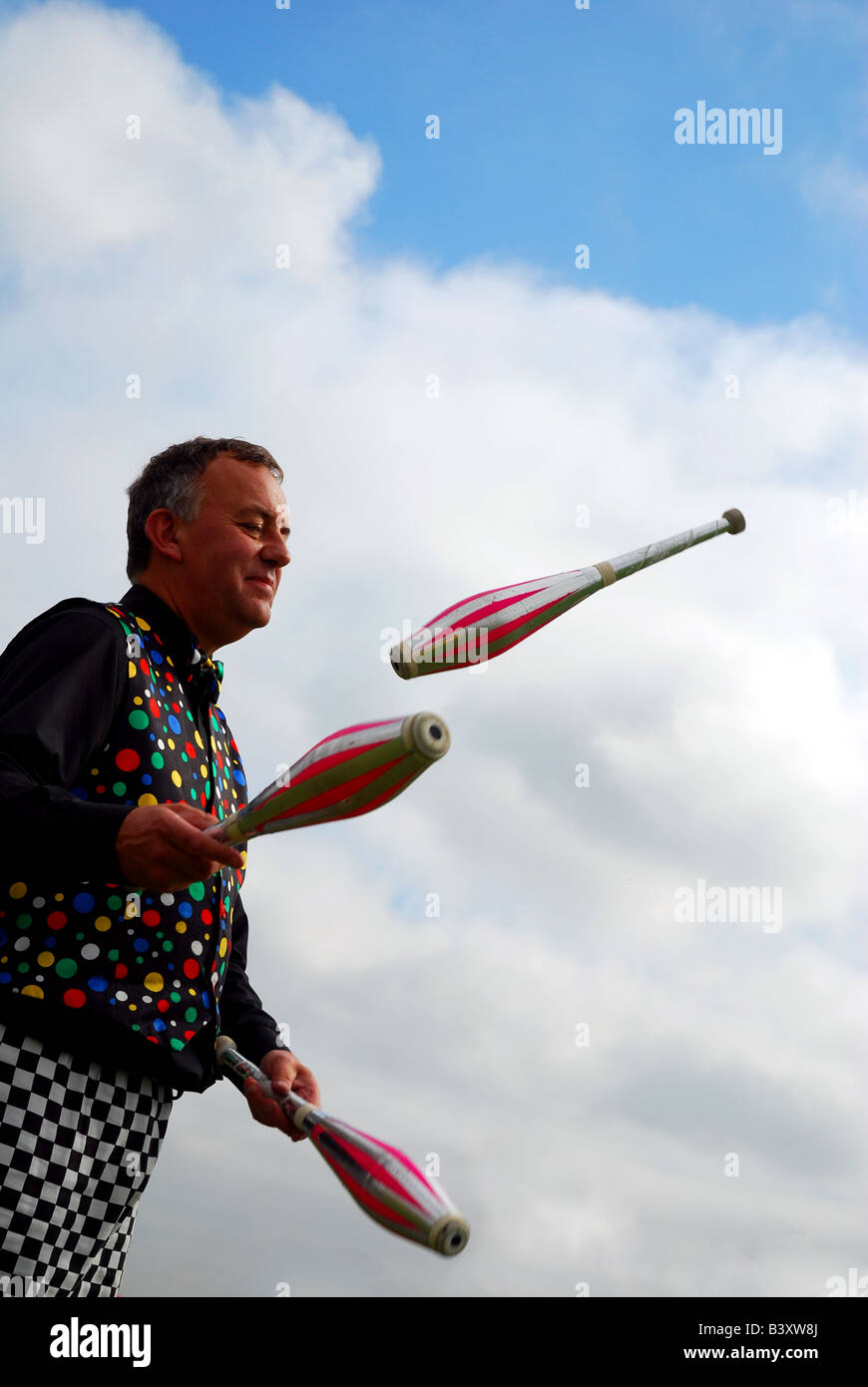 Juggler with battons Stock Photo