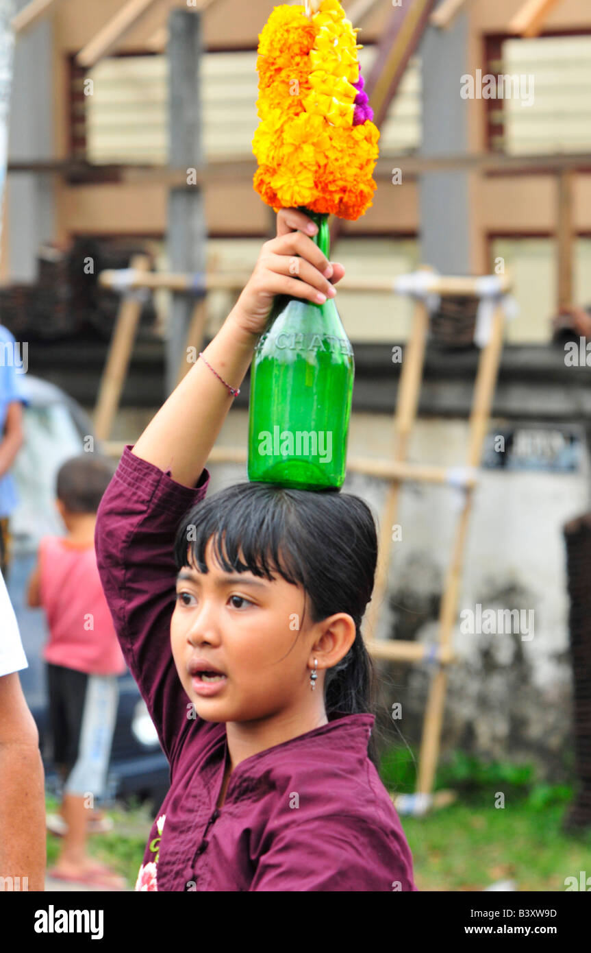 Young Girl With Offerings During Mass Cremation funeral Ceremony In 