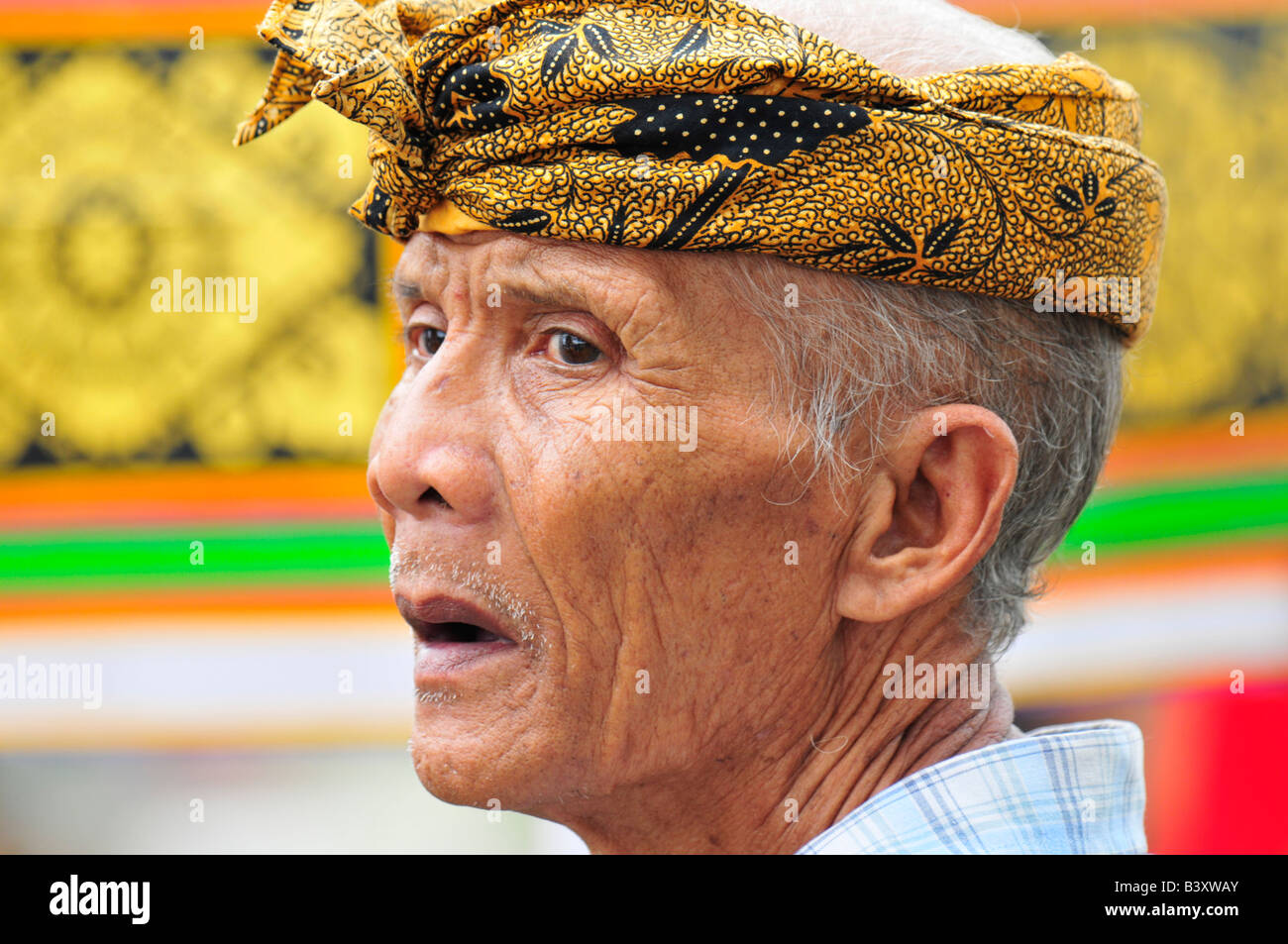 old balinese man at mass village funeral/cremation, gianyar , bali , indonesia Stock Photo