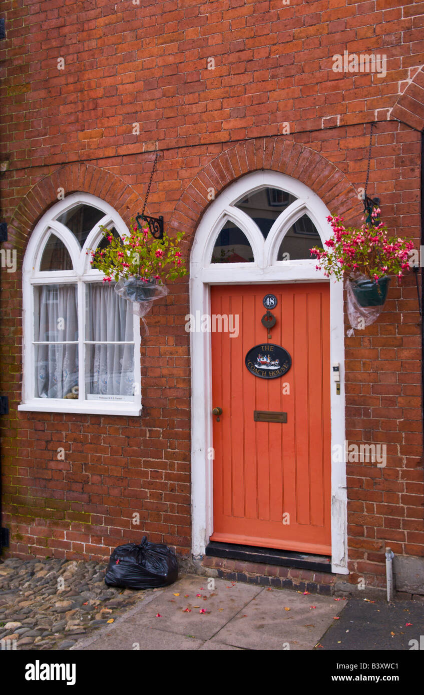 Window and front door with glazed fanlight of townhouse in Ludlow Shropshire England UK Stock Photo
