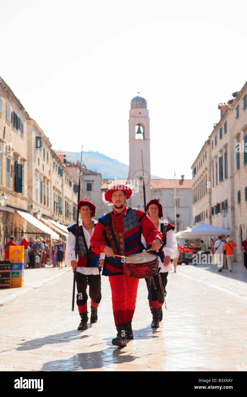 soldiers in historical costumes walking along the main street Stradun in the old town of Dubrovnik, Republic of Croatia, Eastern Stock Photo