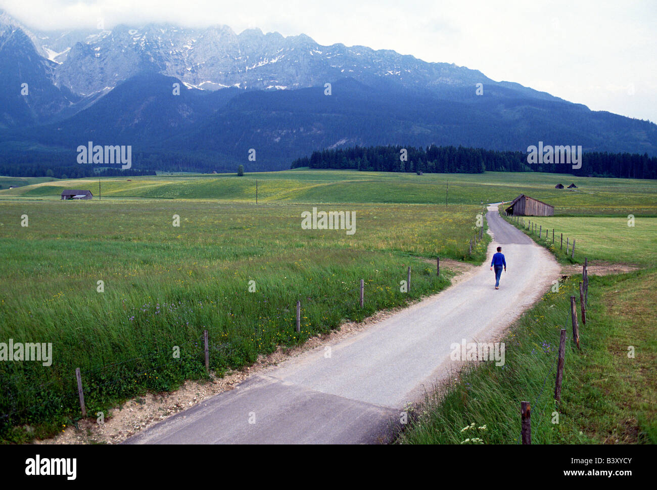 Man walking on country road hi-res stock photography and images - Alamy