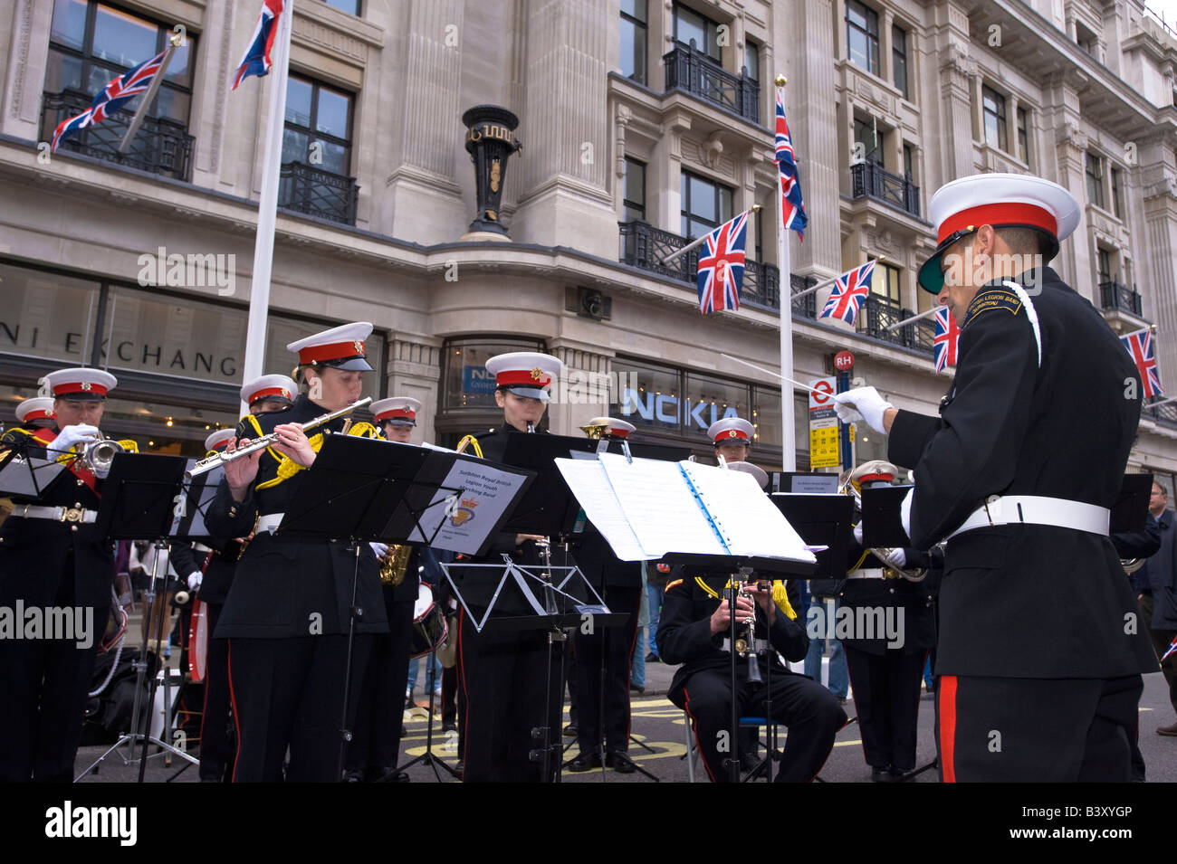 Brass band performing during Regent Street Festival London W1 United Kingdom Stock Photo