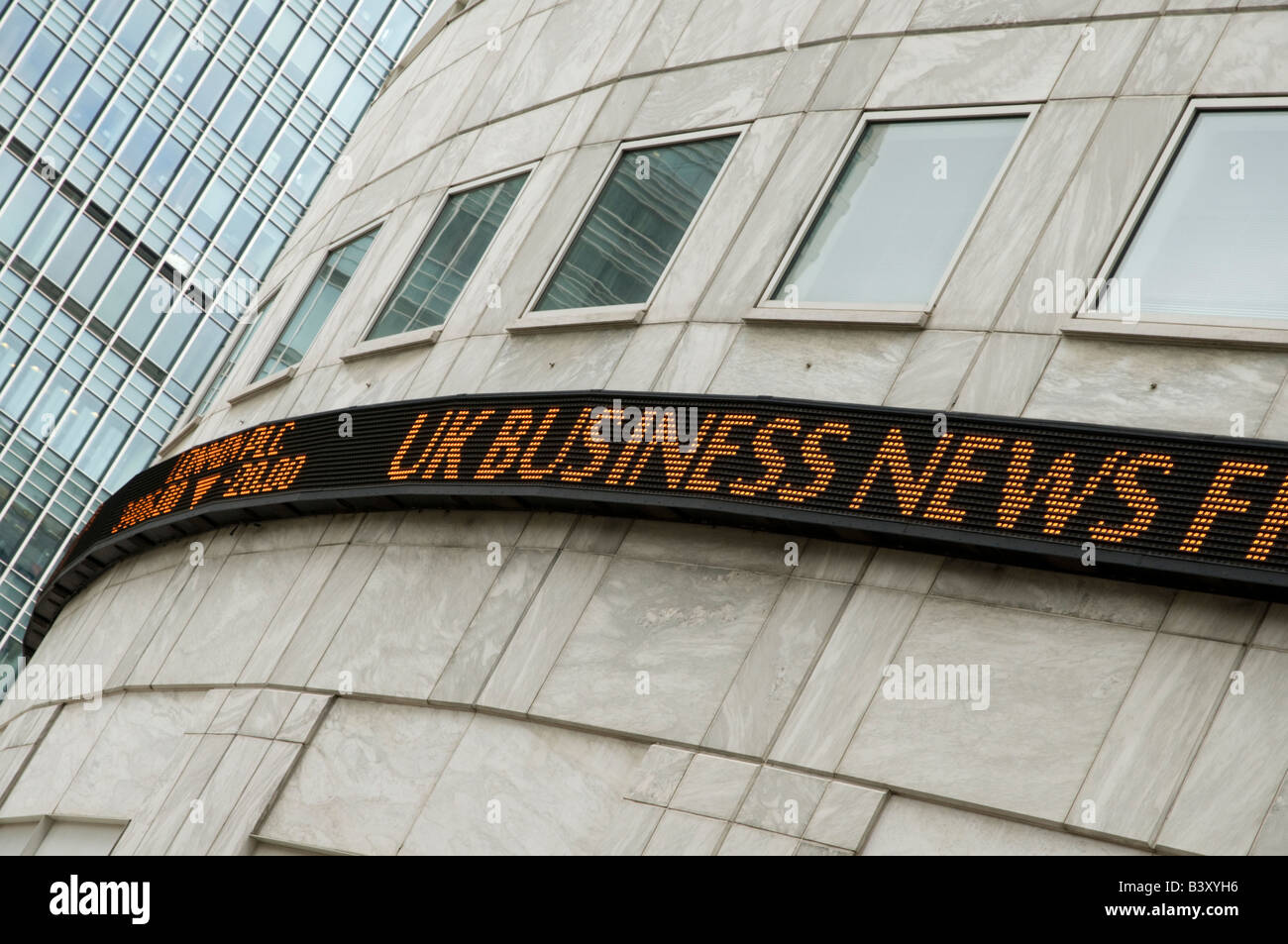 Reuters ticker at Canary Wharf London England UK Stock Photo