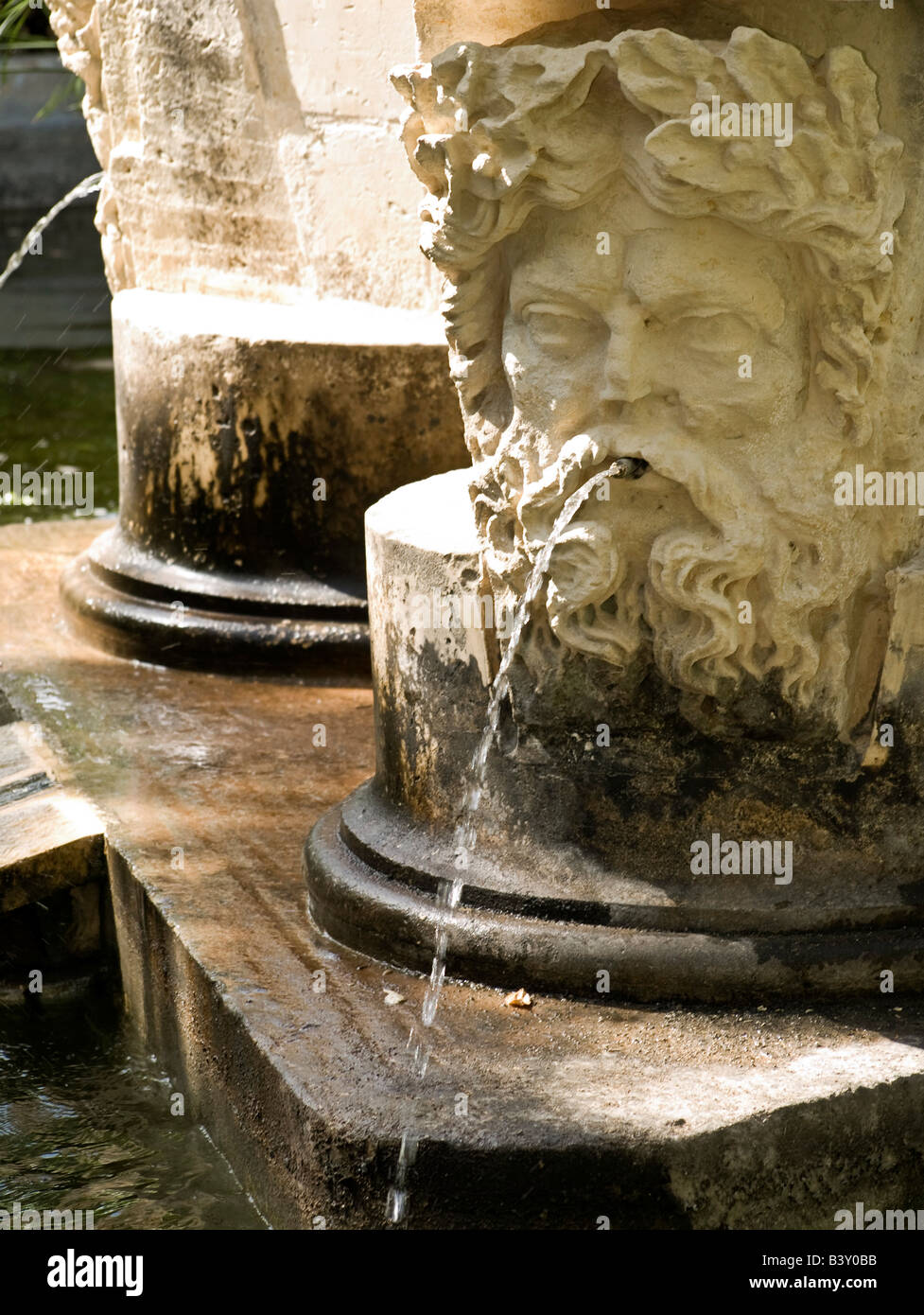 Detail of a medieval fountain in a public garden in Malta Stock Photo
